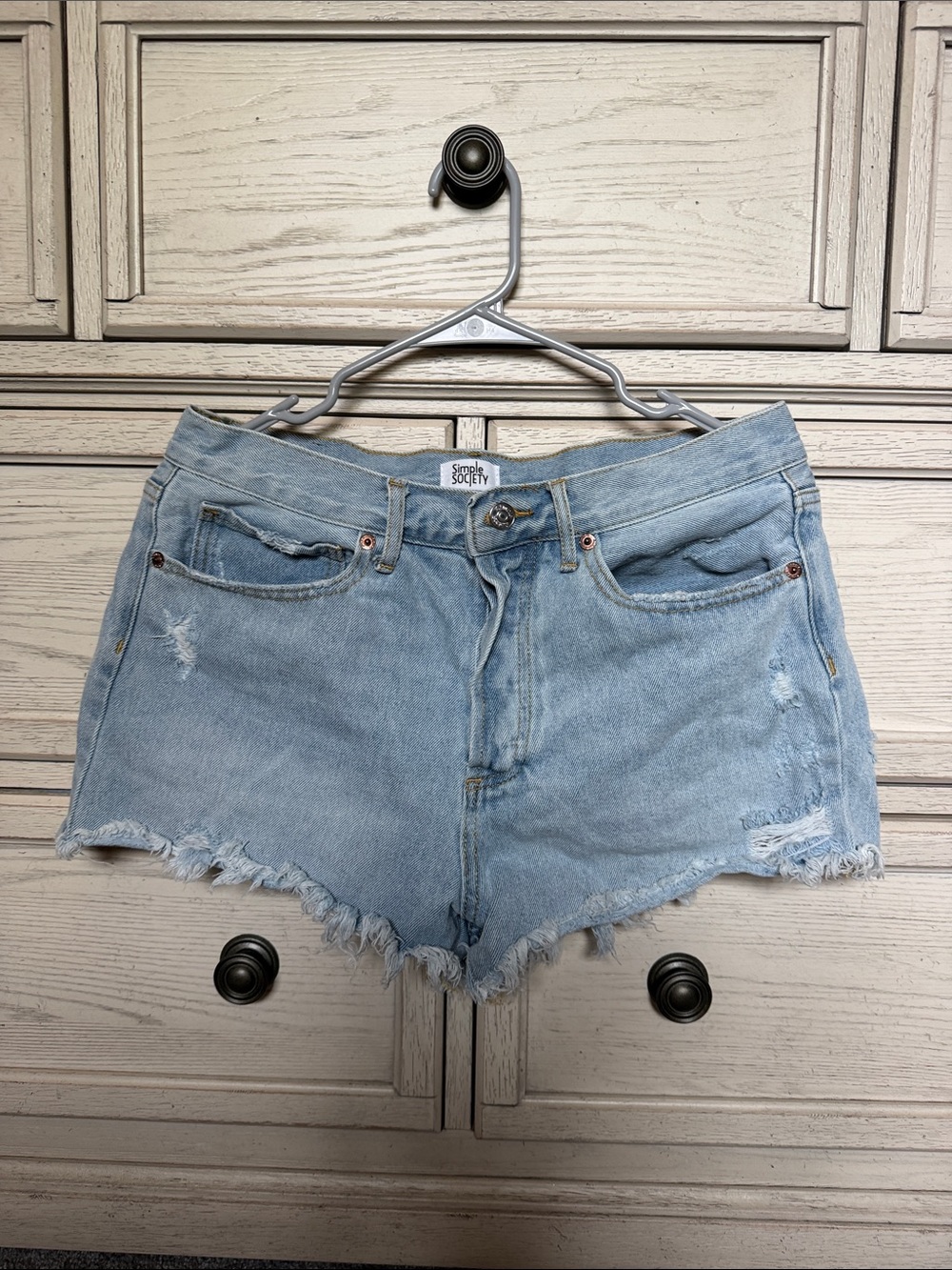 Women’s Light Blue Distressed Denim Shorts